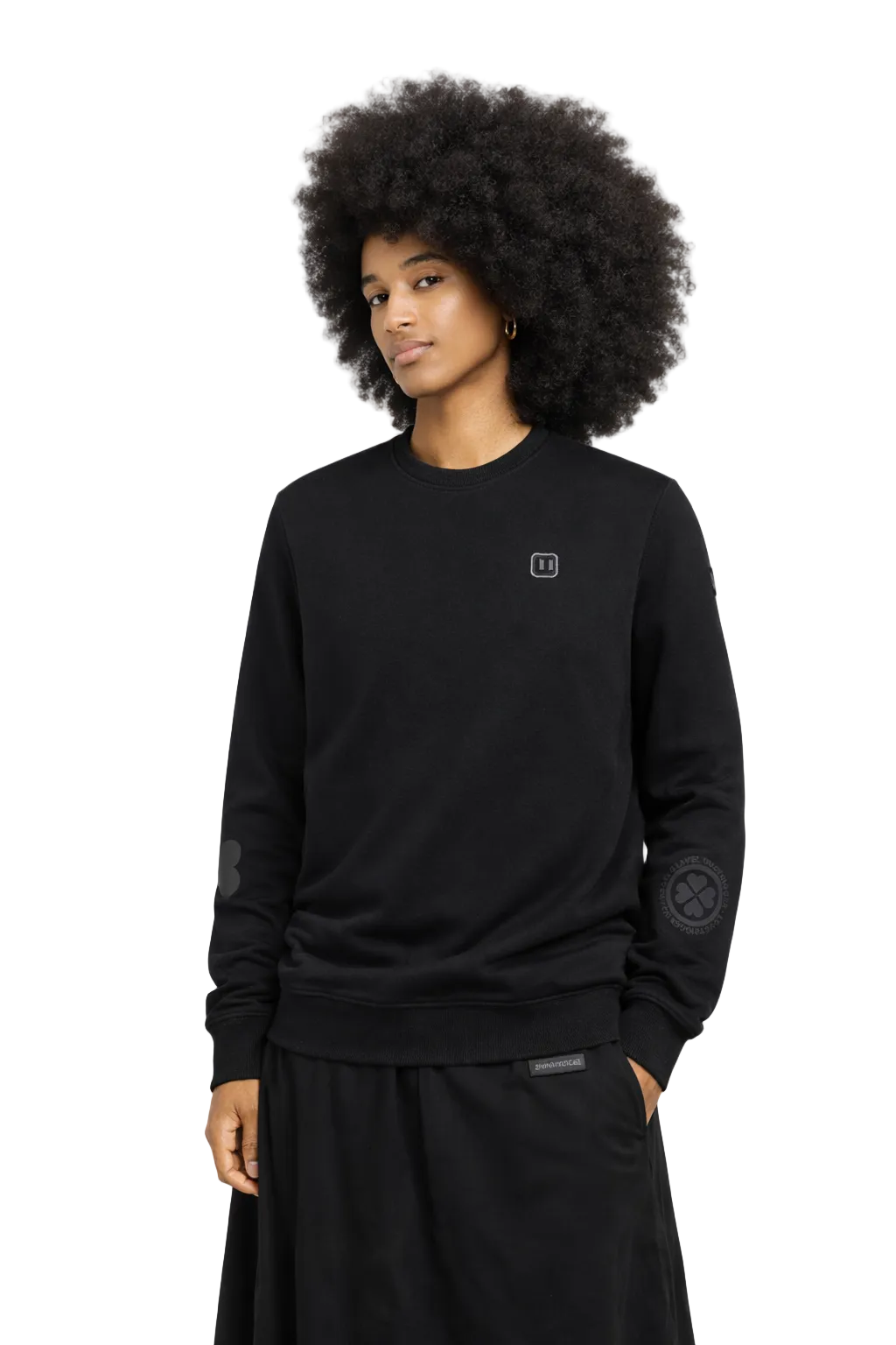 Model afro wearing Lovetrigger SVERRE black sweater editorial street style