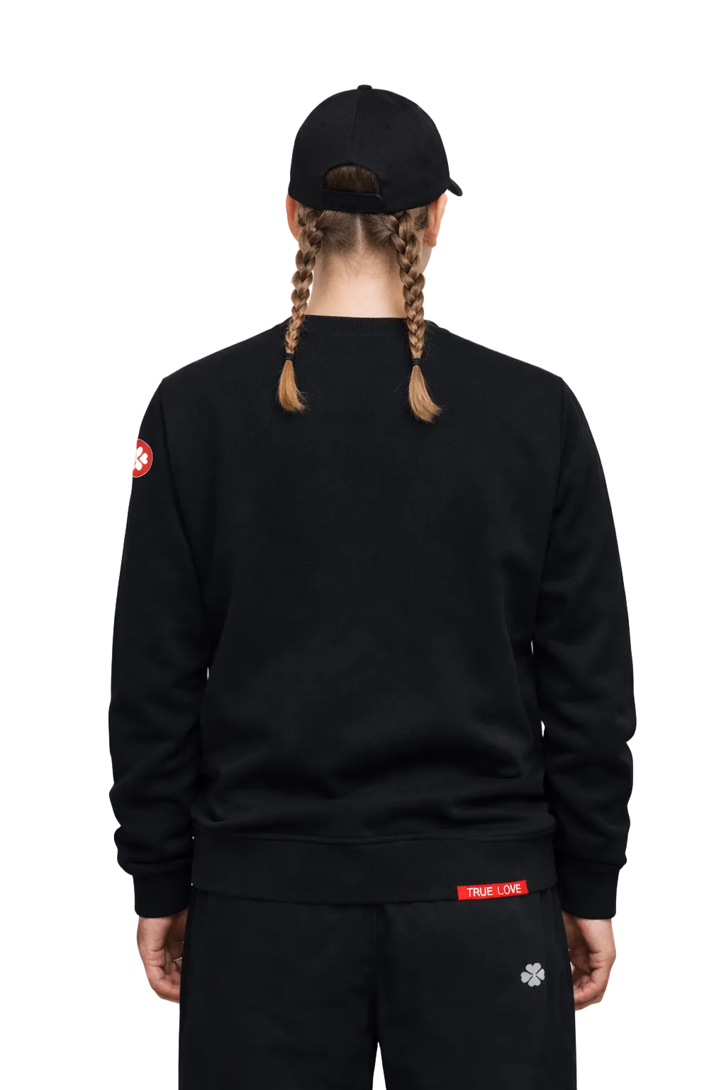 Model wearing Lovetrigger SAMM black sweater editorial fashion style