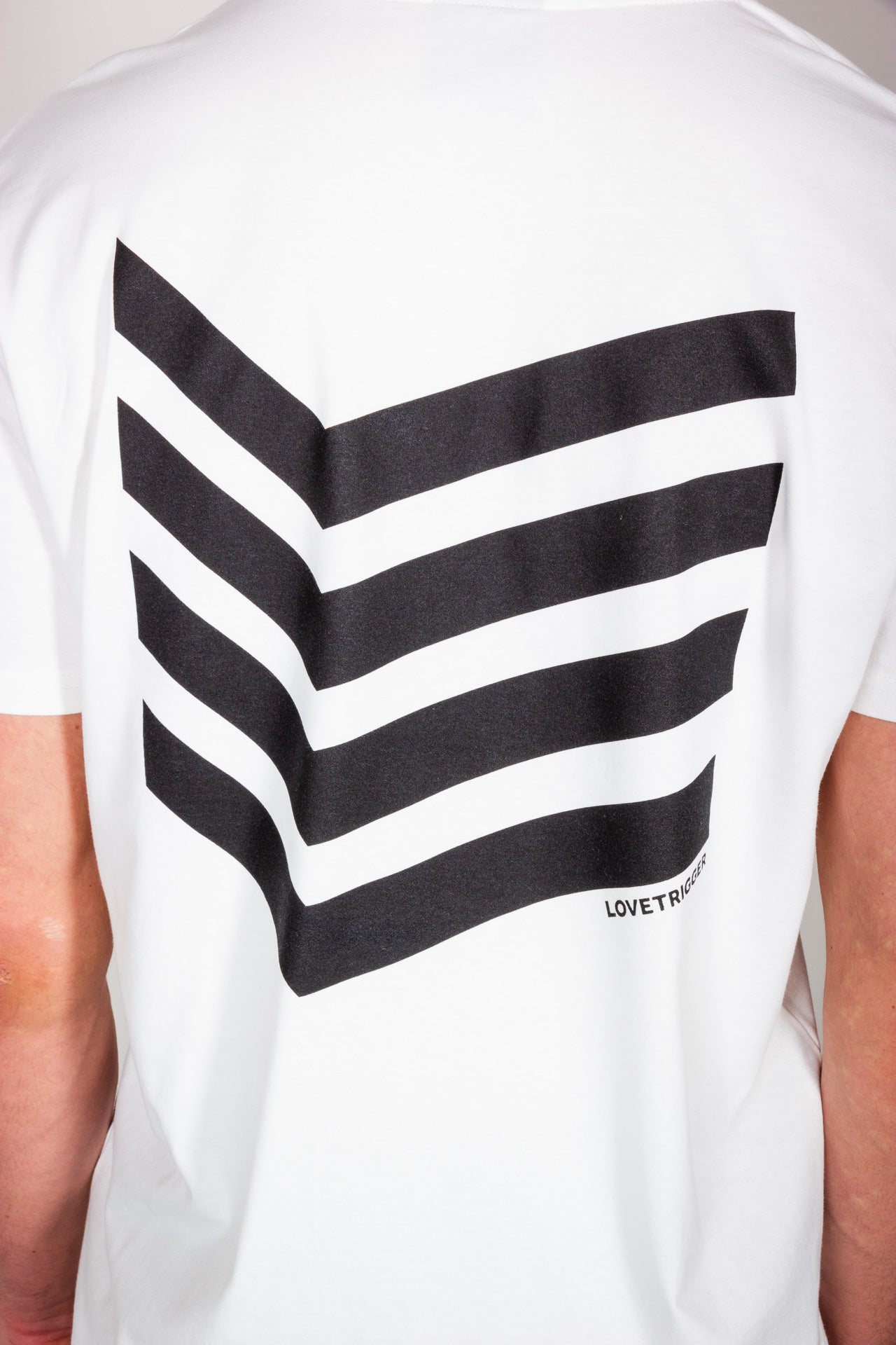 TAHA off white t-shirt biologisch katoen achterkant print